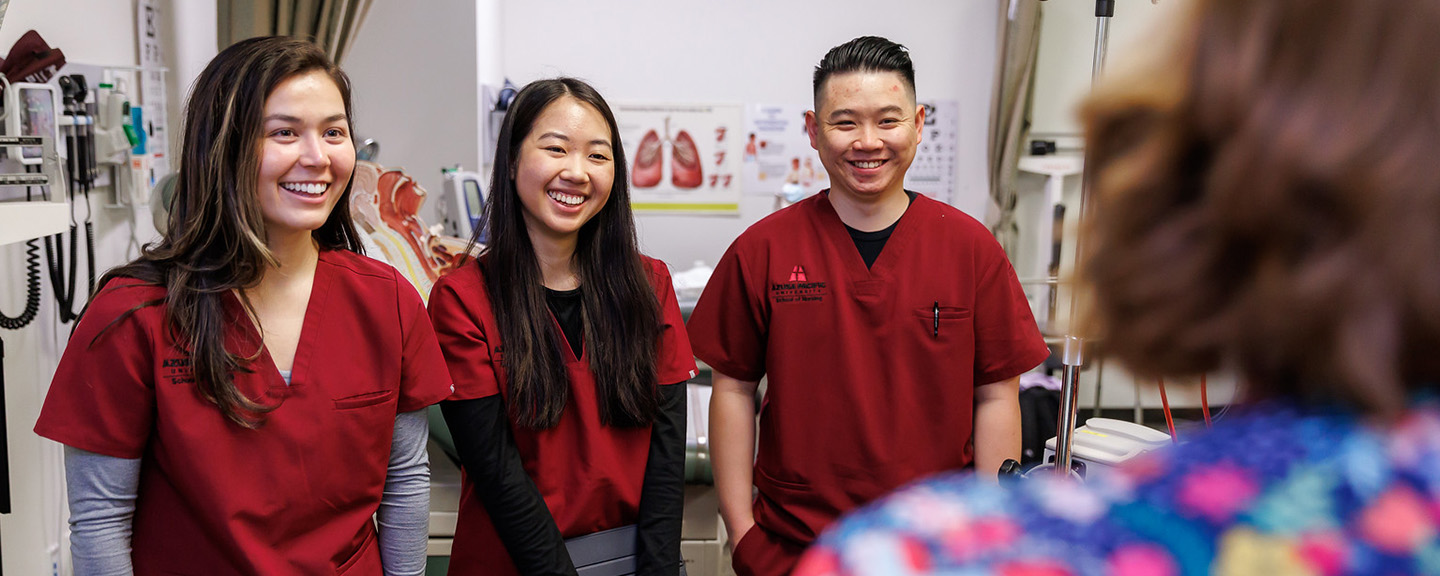 Students smiling and listening