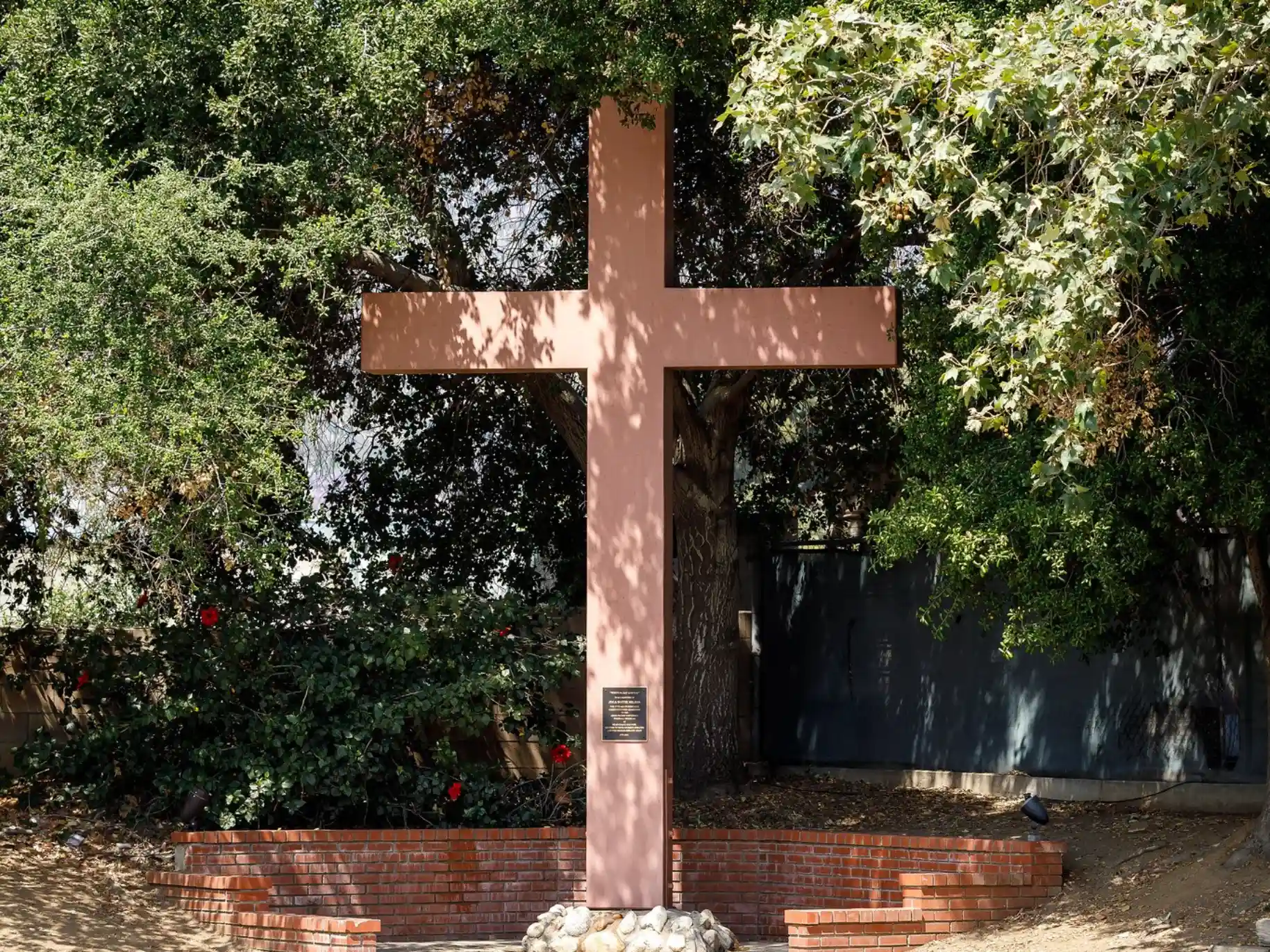 A wood cross at the back of Cougar Stadium.