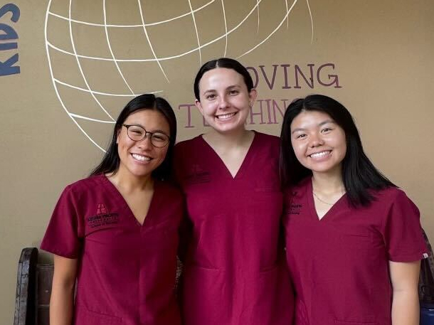 Abigail Tam and two other nursing majors on the team at the birthing clinic.