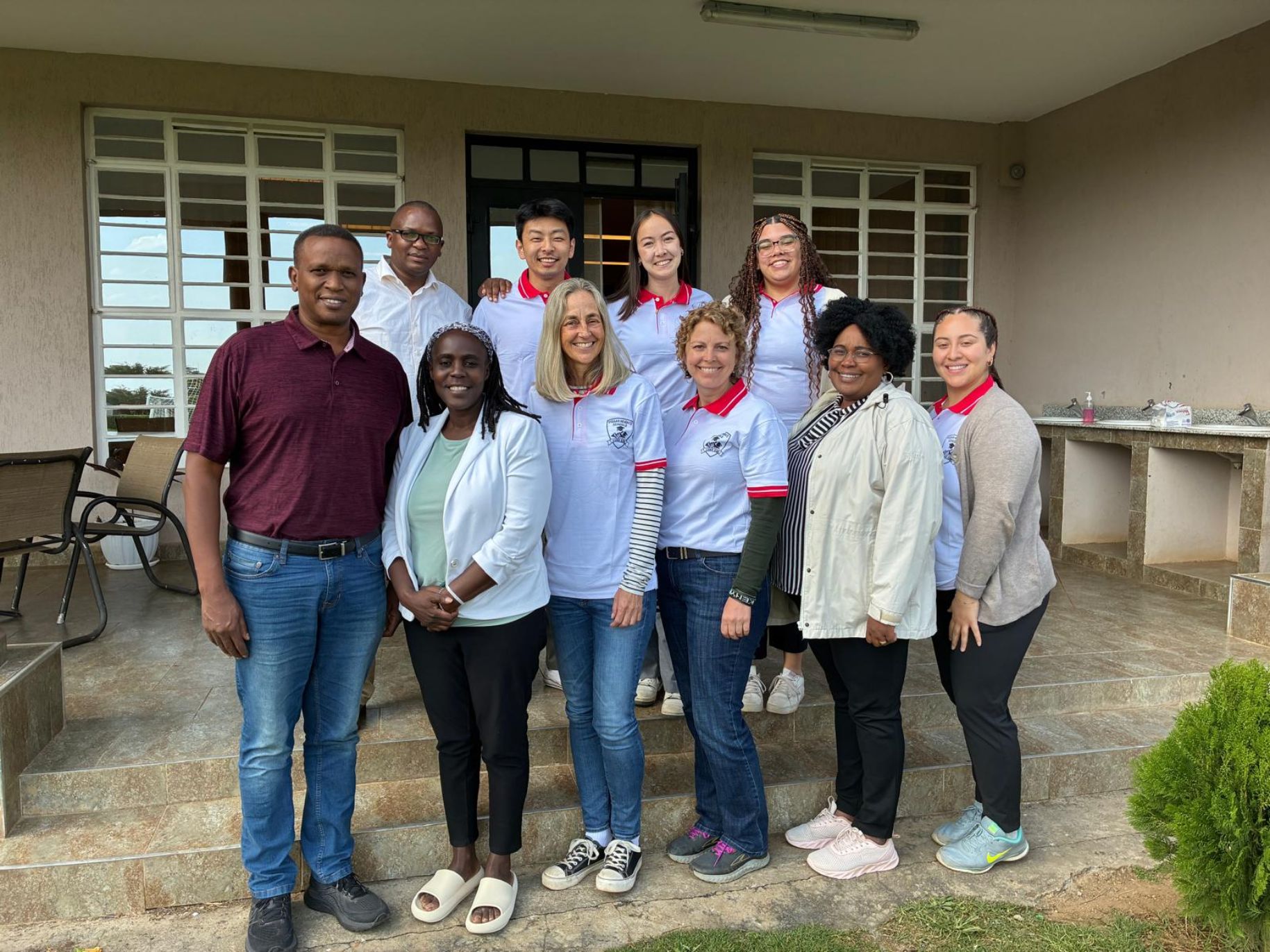 Part of the team stands together in Kenya
