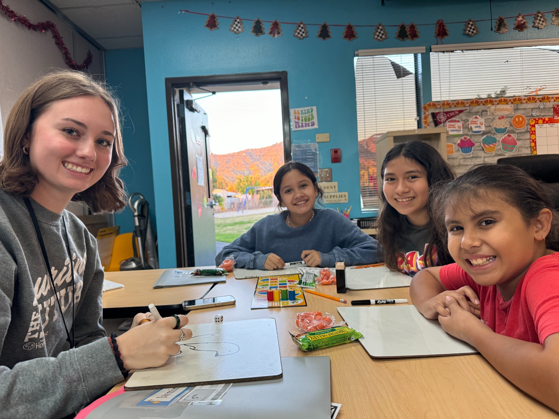 APU student instructs local youth at Neighborhood Homework House