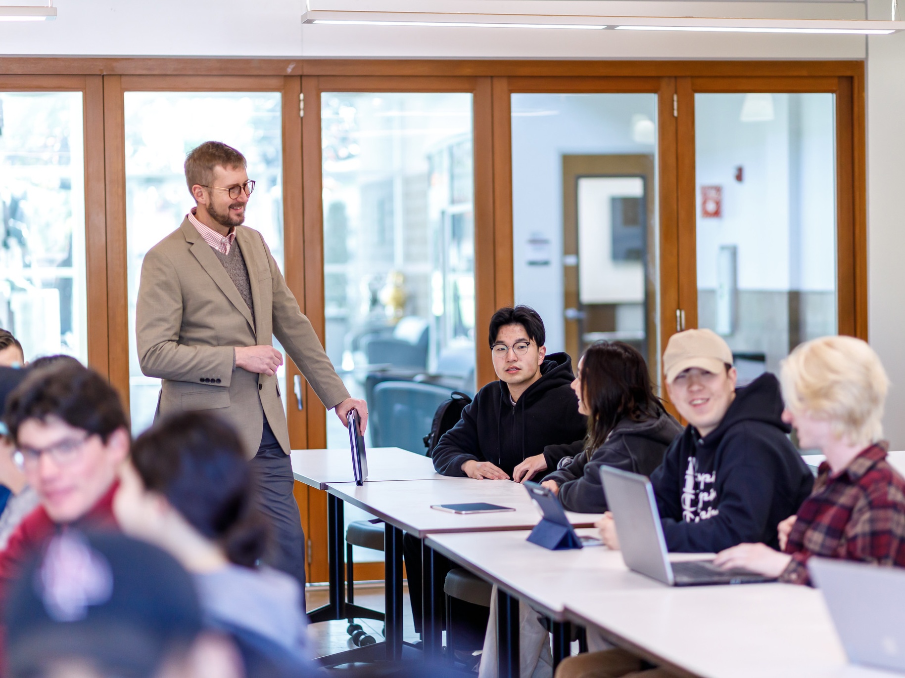 Professor Mark Cawman interacts with students in a class