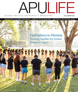 APULIFE front cover of students praying in a circle outside