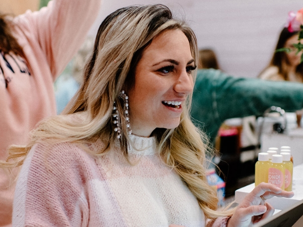 Bailey Wilson wearing pink and smiling