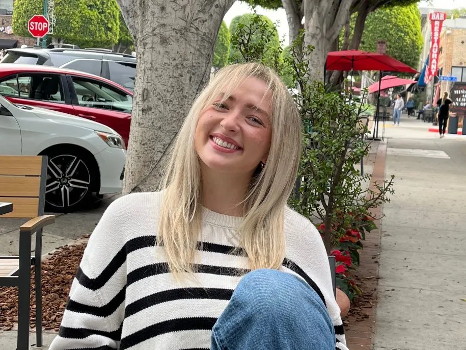 Caroline smiles outside in Glendora