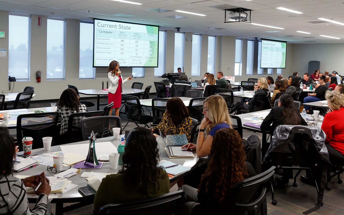 Marlene speaking to a visible audience.