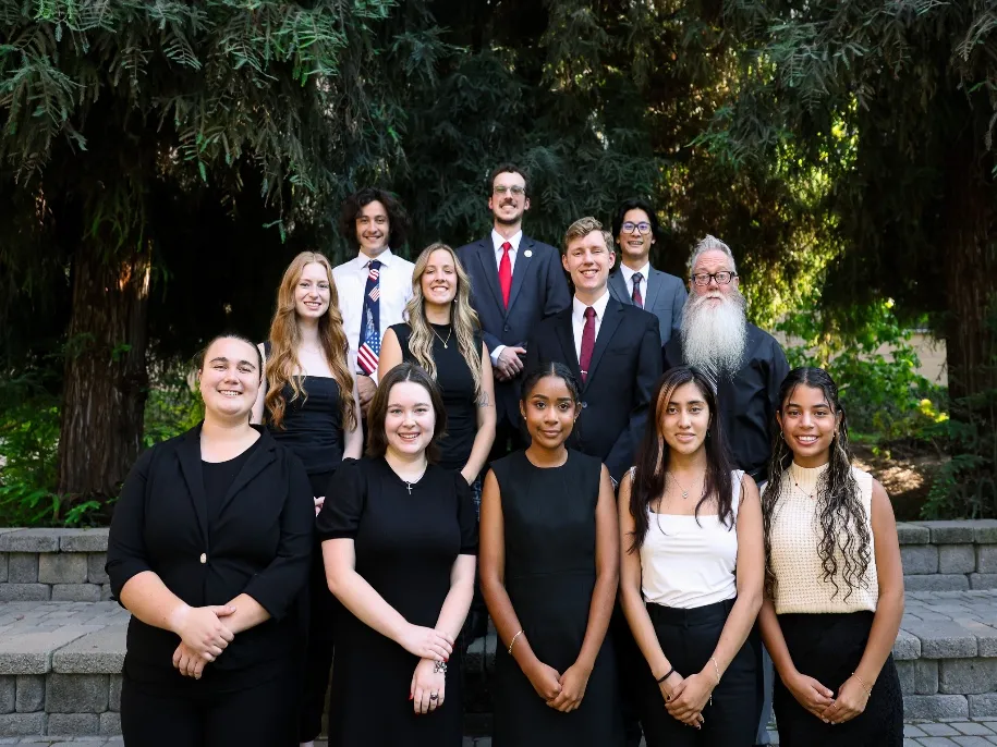 The Student Government Association (SGA) stands together outside for a team picture.