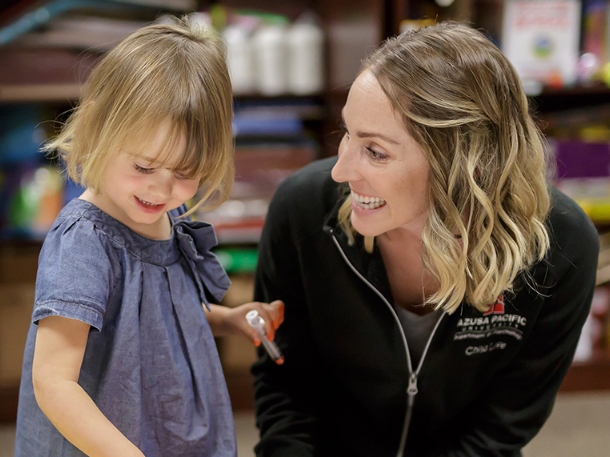 a child with her professor