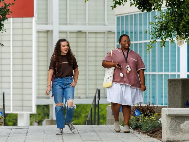students walking on west campus