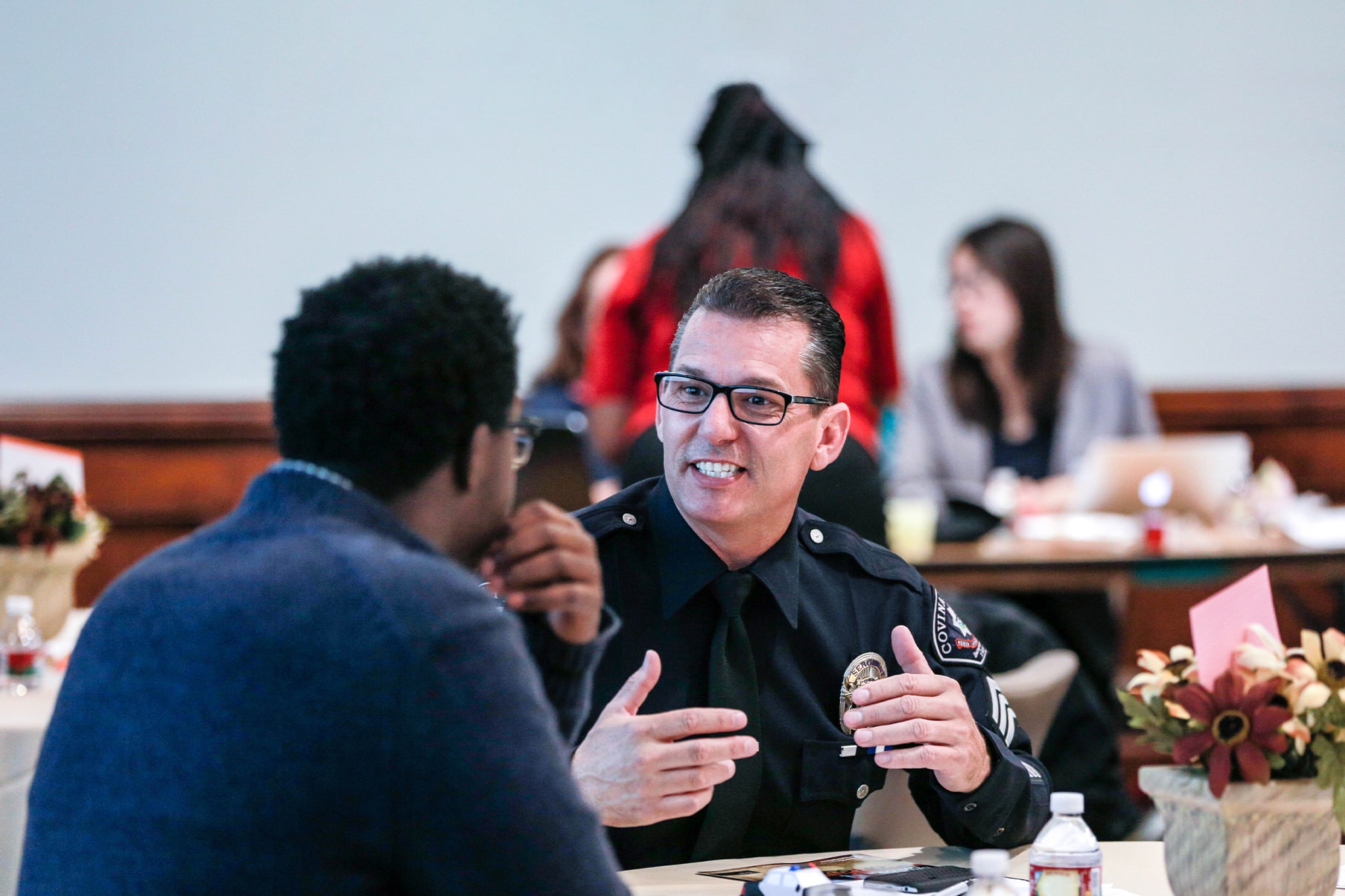 Law eforcement speaking with student