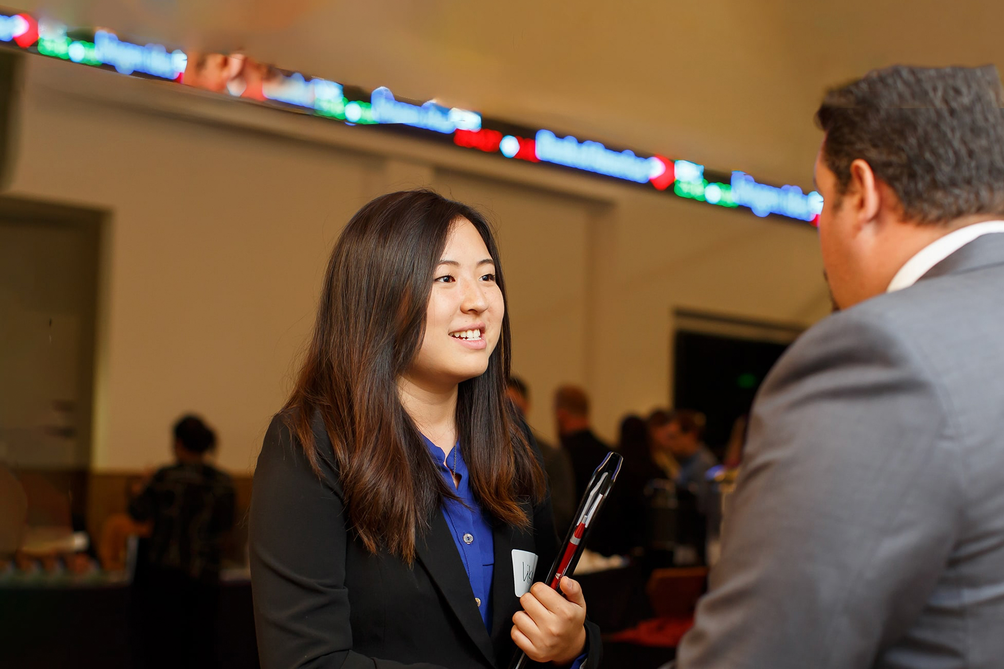 Female business student at career fair