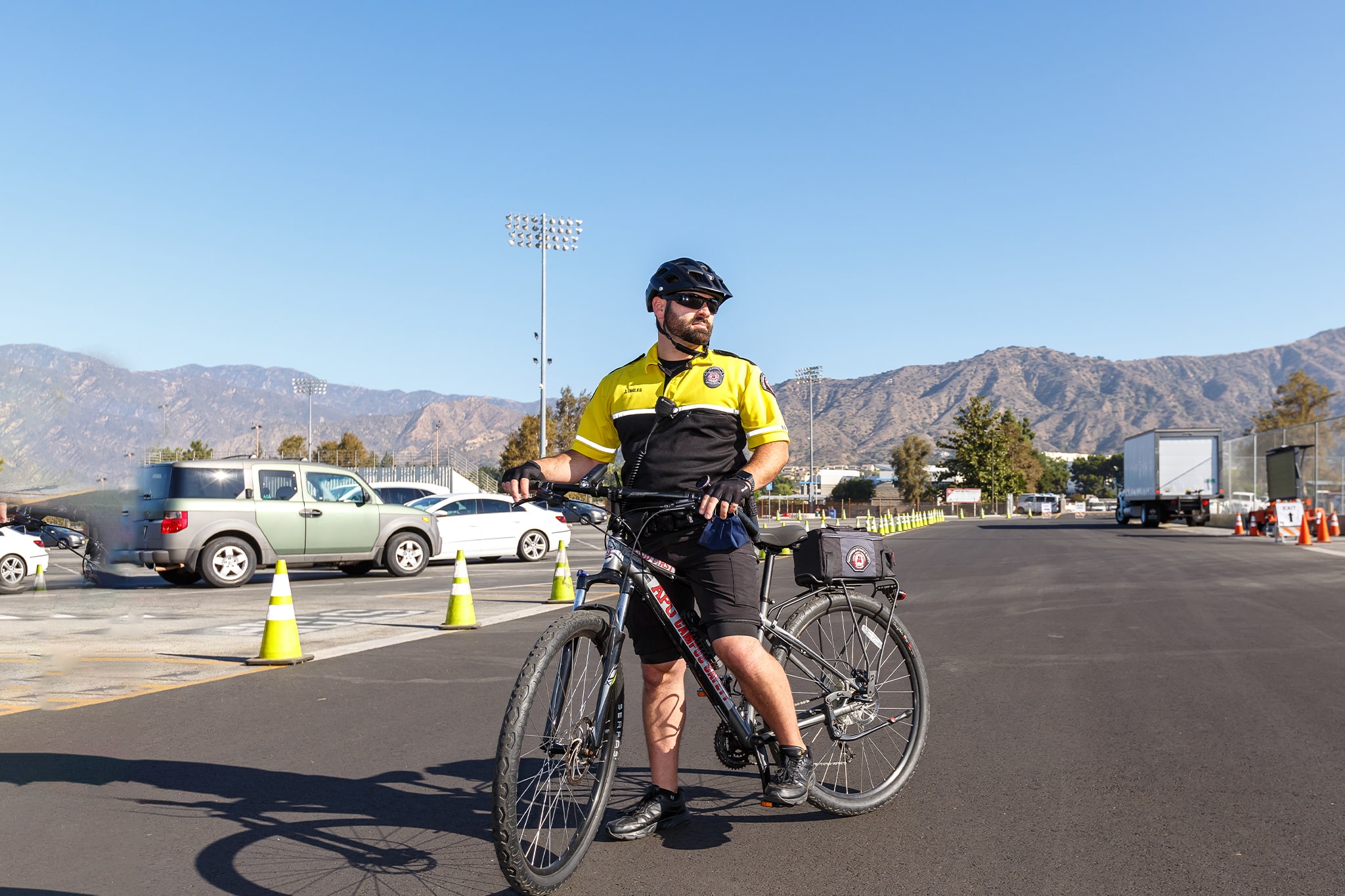 Image of Campus Safety staff rinding his bike