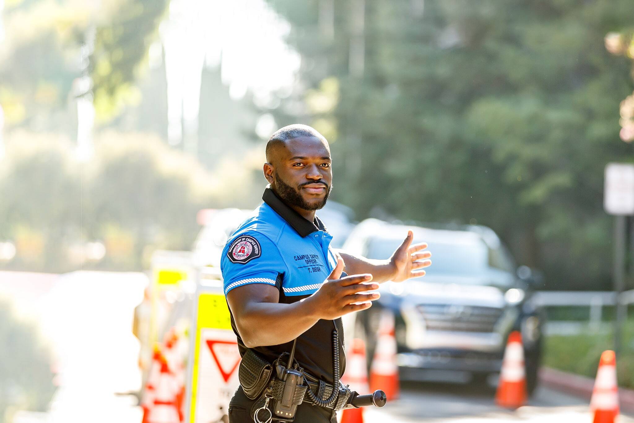 campus safety staff helping students on campus