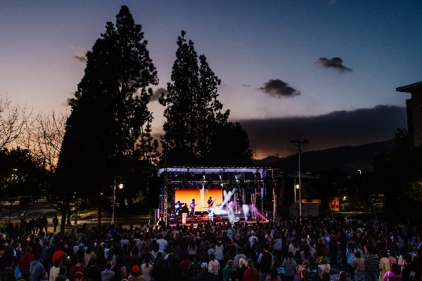 of a stage with students attending an event at apu