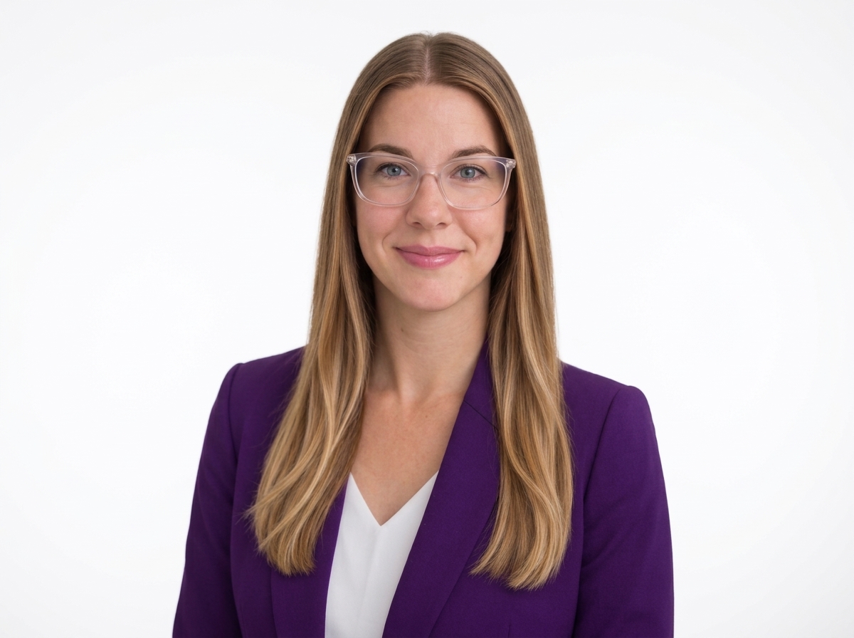A professional headshot of Madalynn Baker.