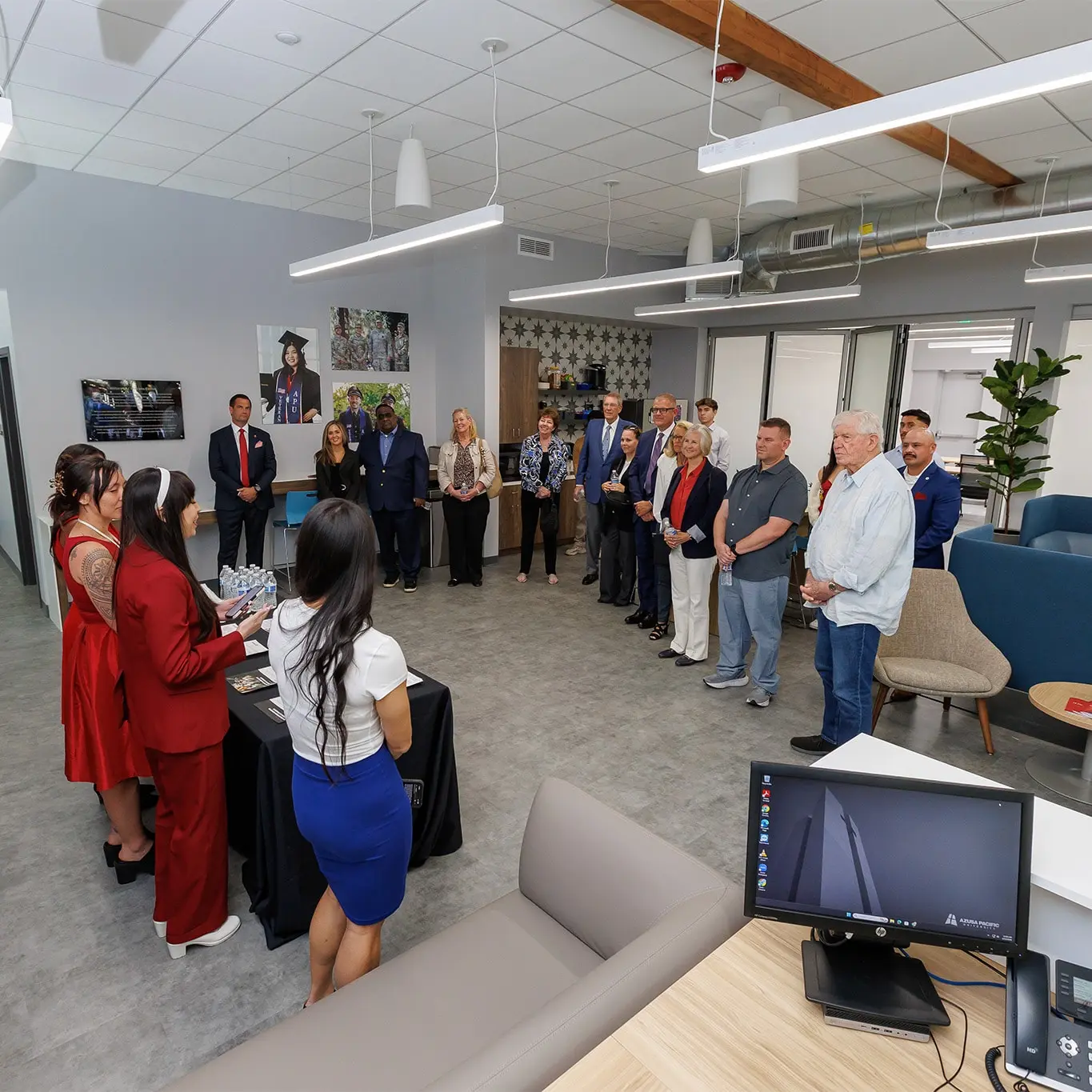 President with important MVC staff inside new center