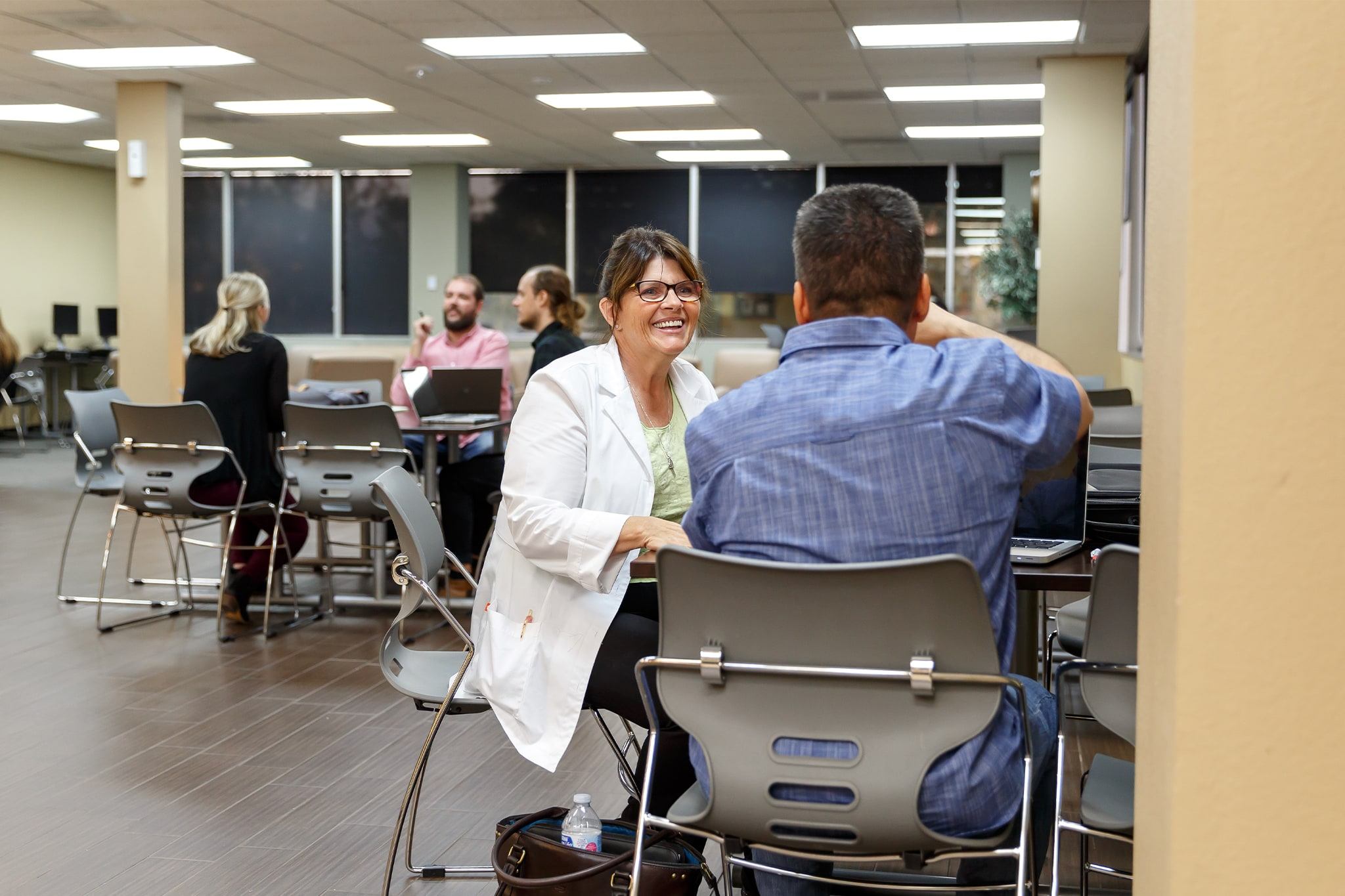  MPH Student discussing at a table