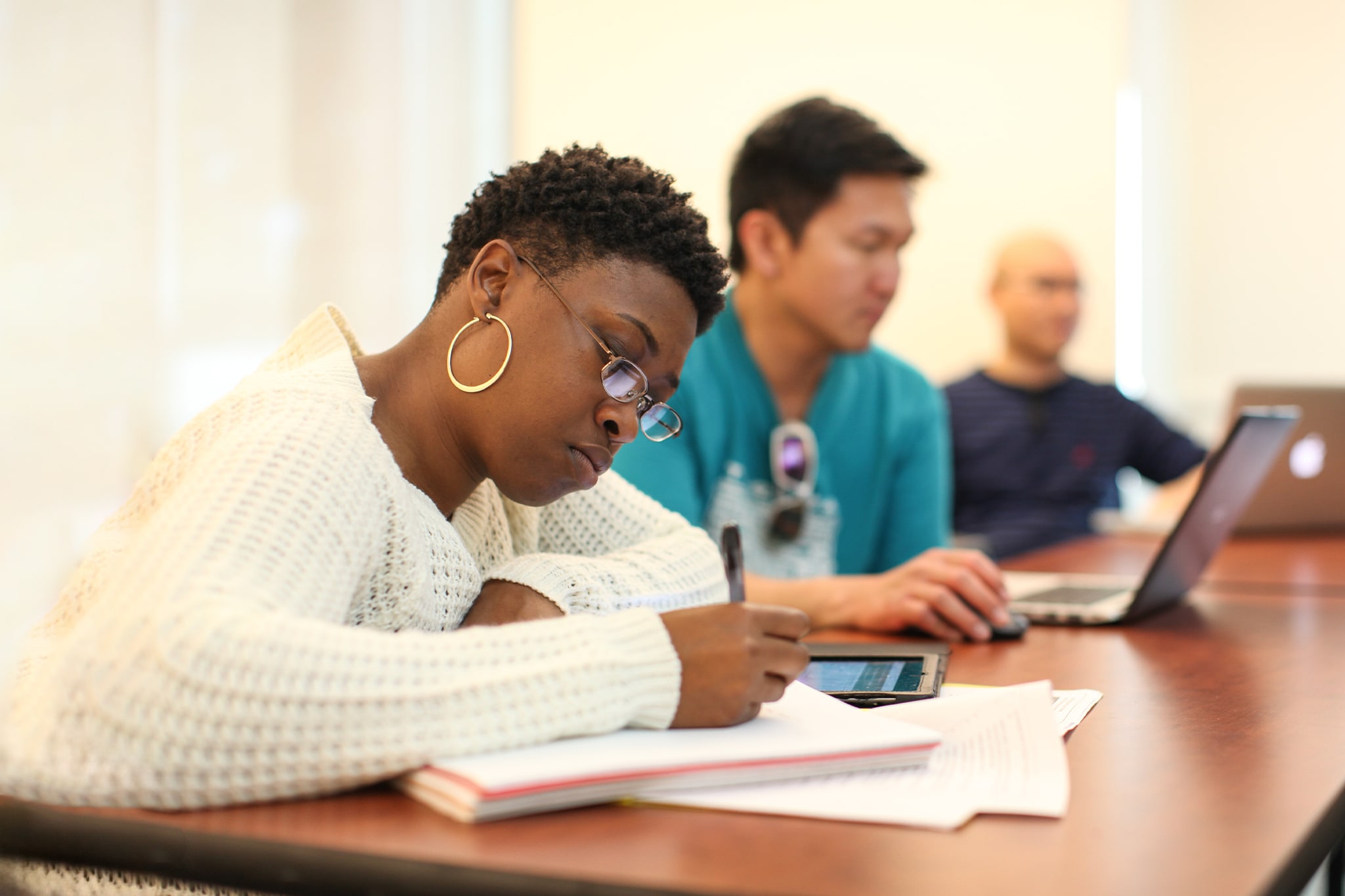 Student taking notes