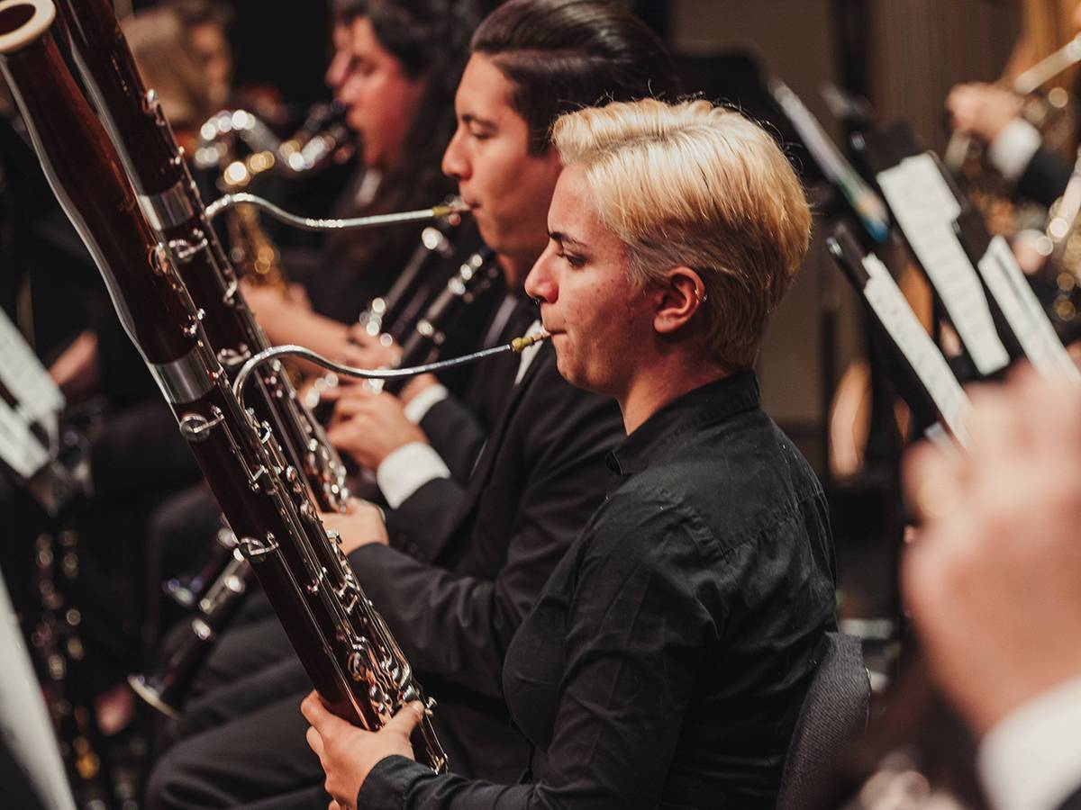 student playing the oboe