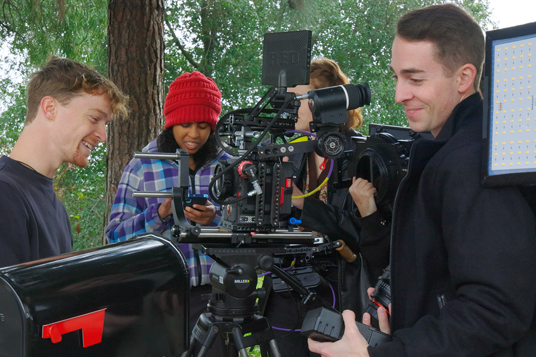 Students working with a camera