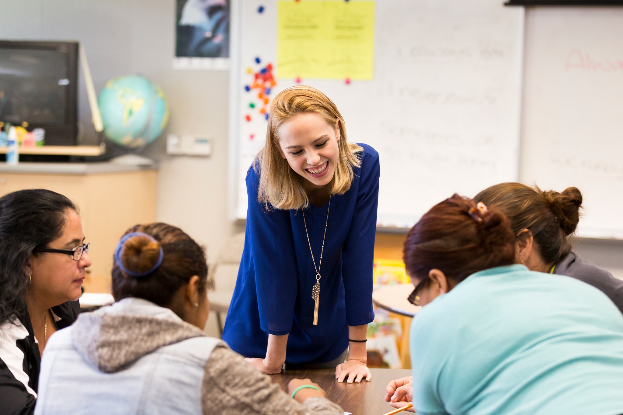 a professor teaching kids in the classroom